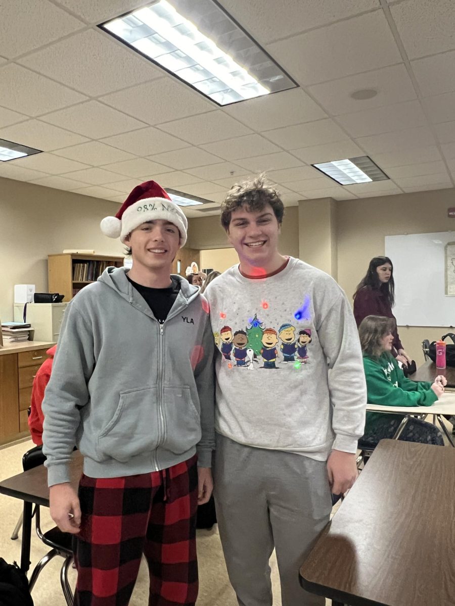 Jackson Hegwood 25 and Landon Stenger 24 dress up in Christmas spirited clothes.