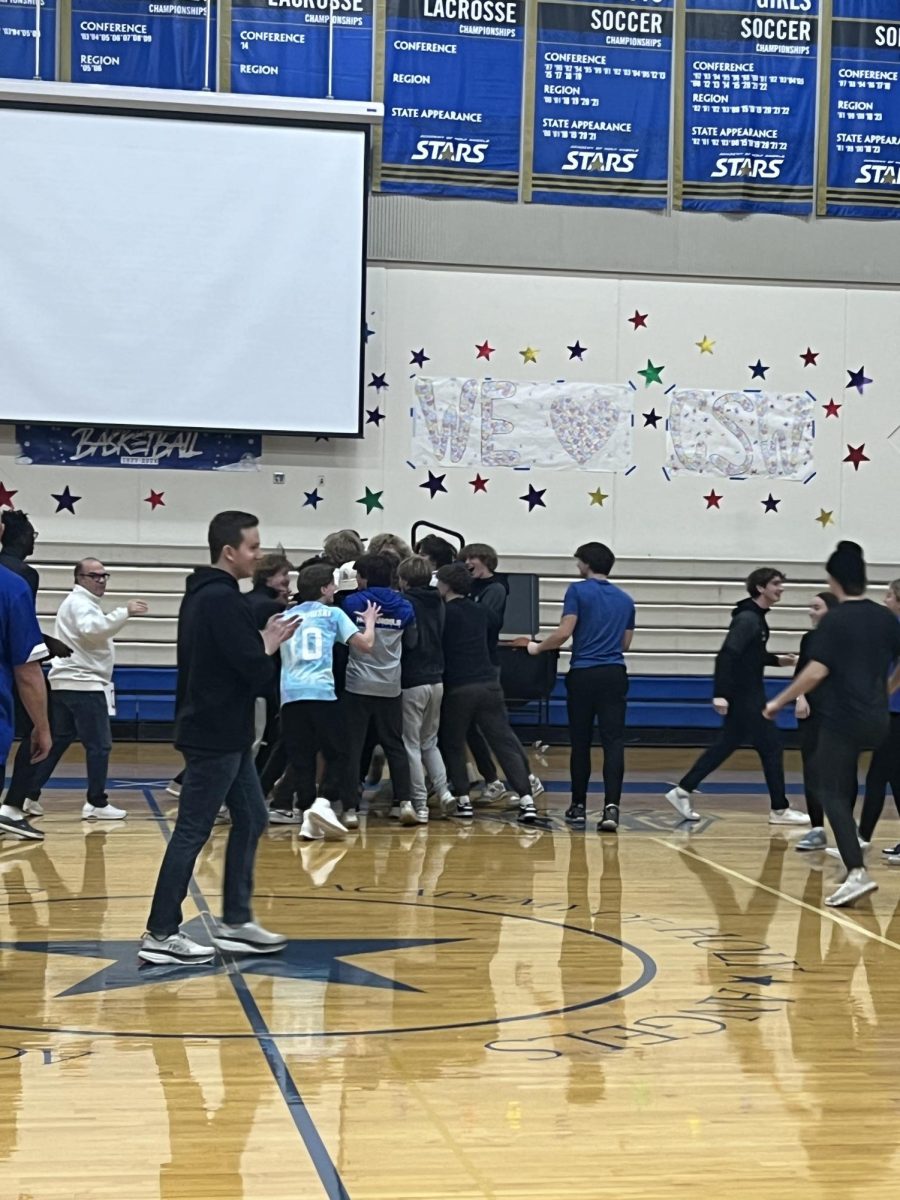 Juniors celebrating their win in the Stars Pepfest Shootout.